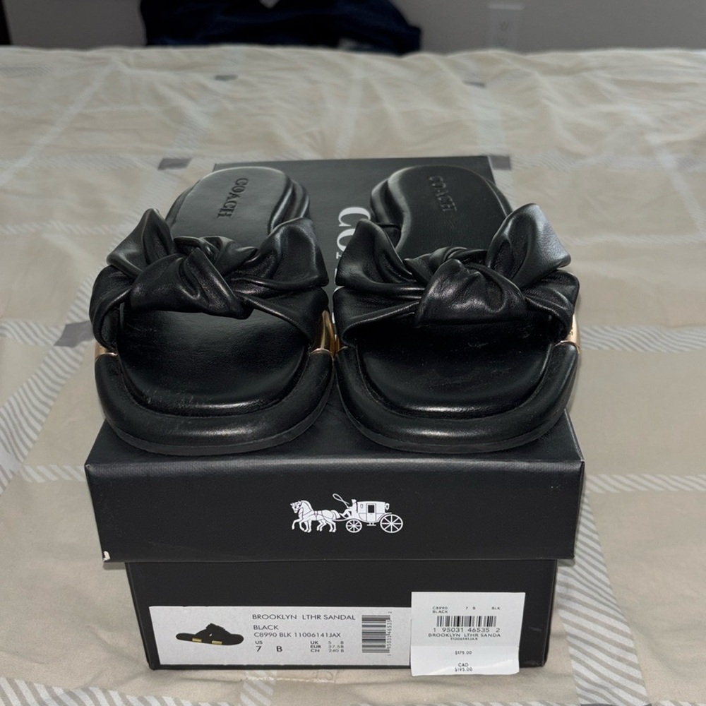 Coach leather sandals (style name Brooklyn)
Size 7 
Black